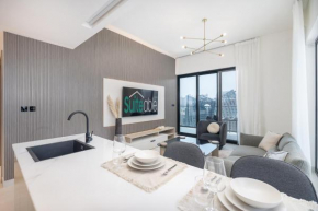 Canal front apartment with Burj Khalifa view by Suiteable